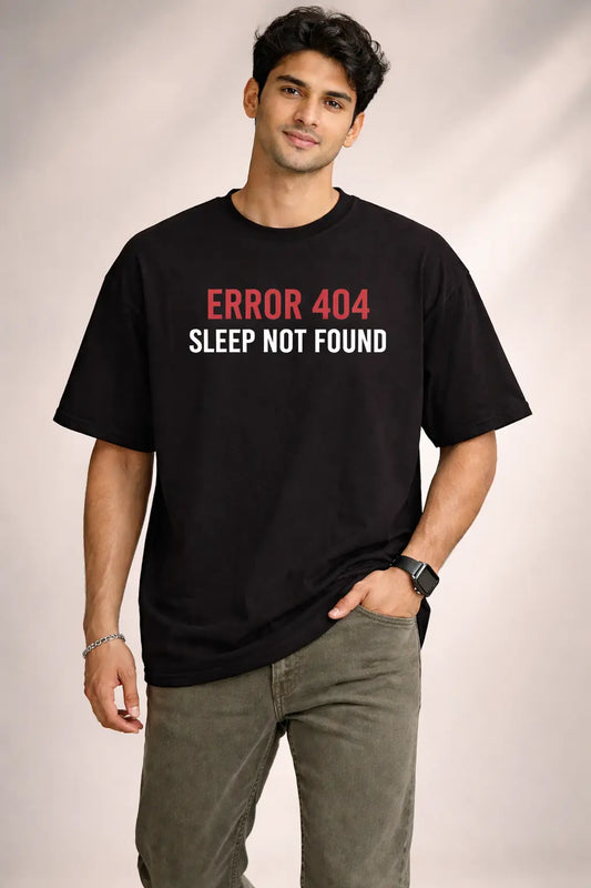 Person wearing a black t-shirt with 'ERROR 404 SLEEP NOT FOUND' text  