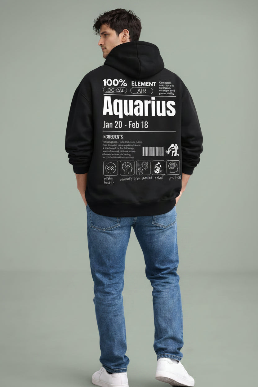 Person wearing a black hoodie with Aquarius zodiac design  

