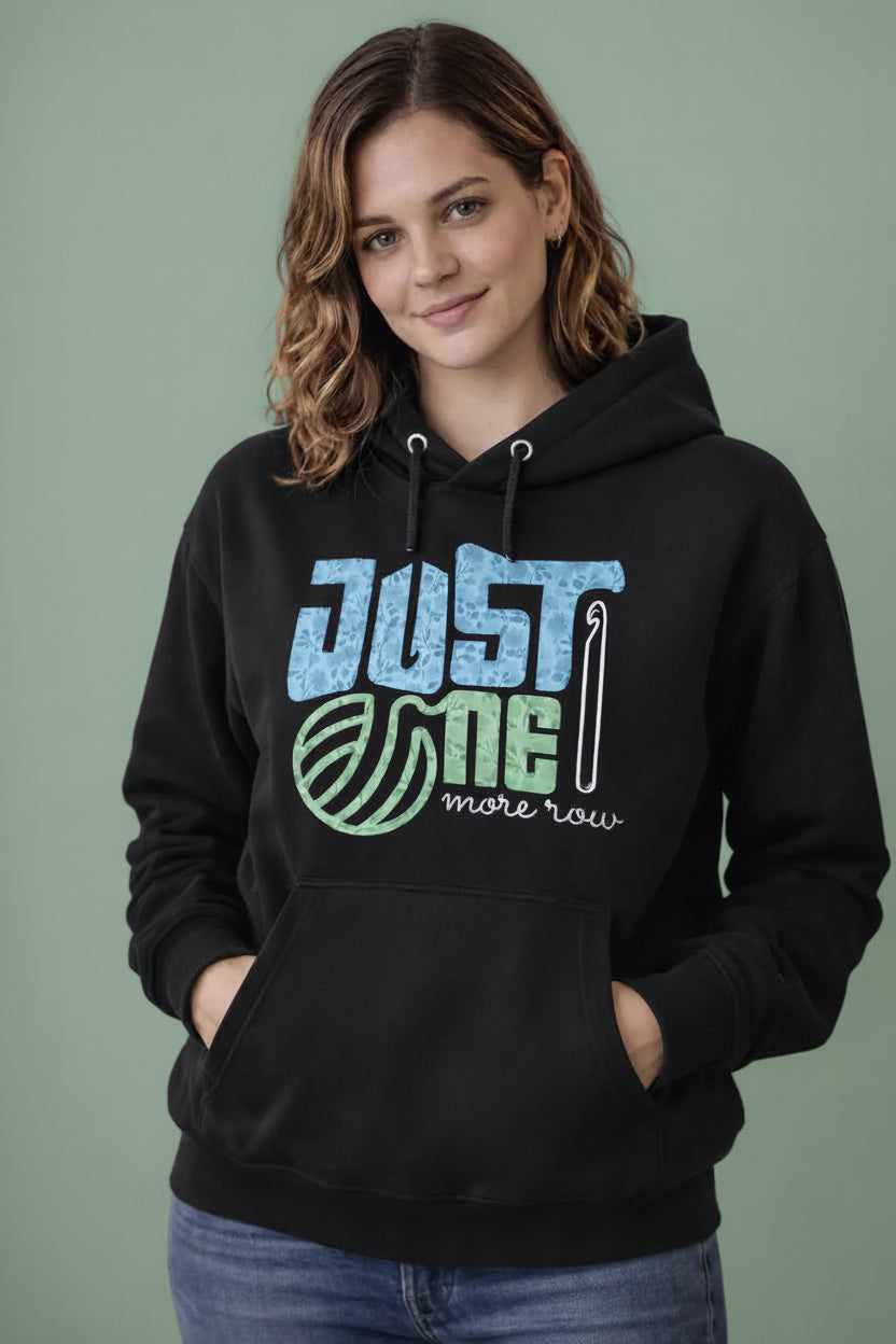 Woman wearing a black oversized hoodie 