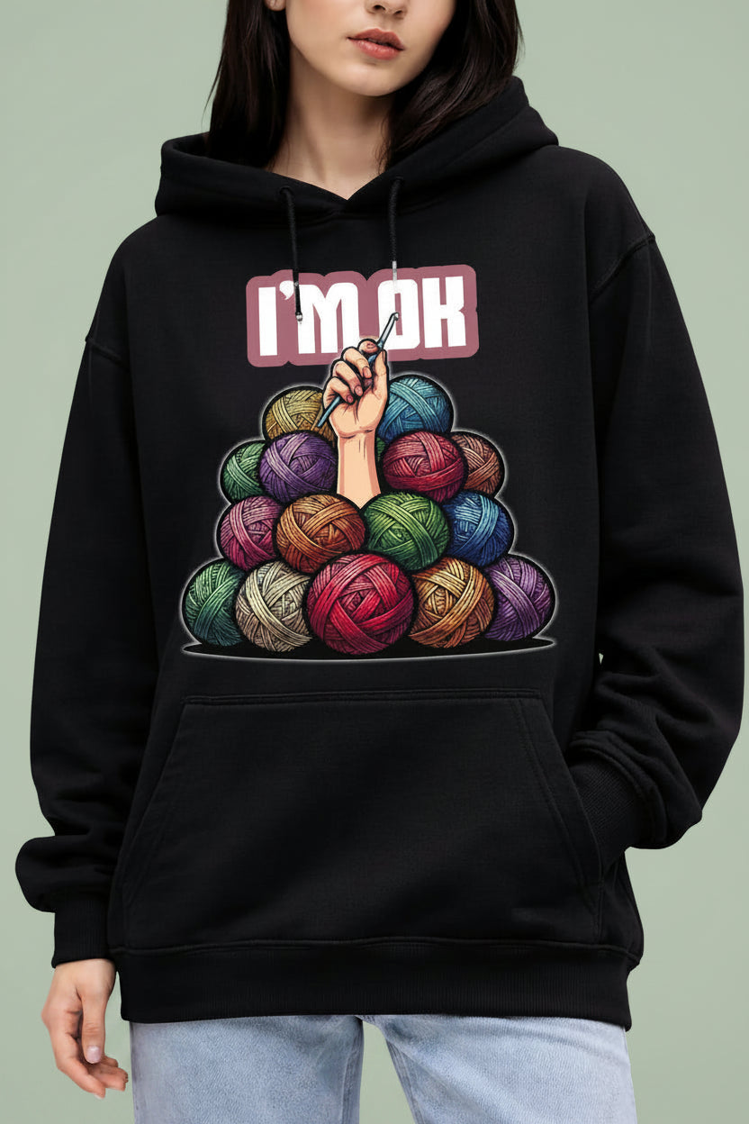 Black oversized hoodie with colorful yarn design  