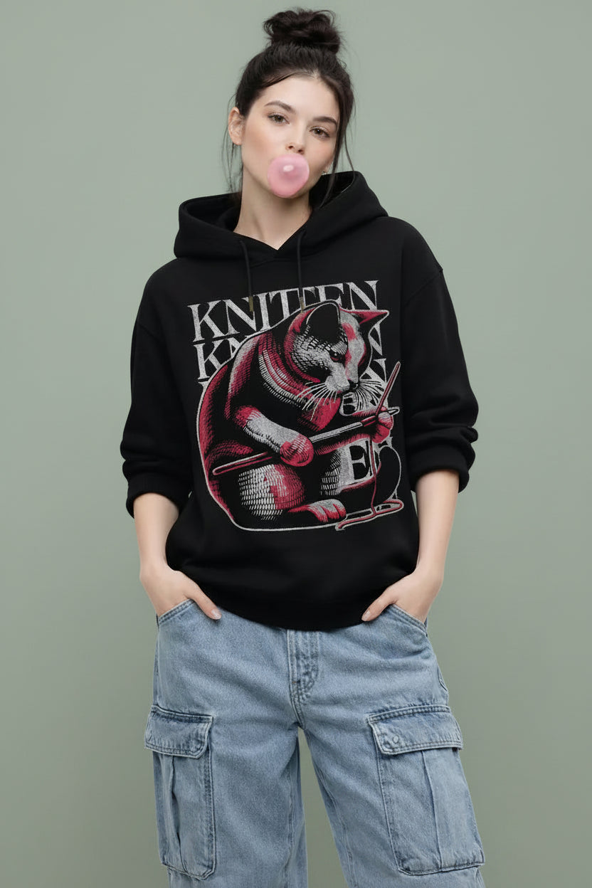 Person wearing a black premium oversized hoodie with beautiful design 