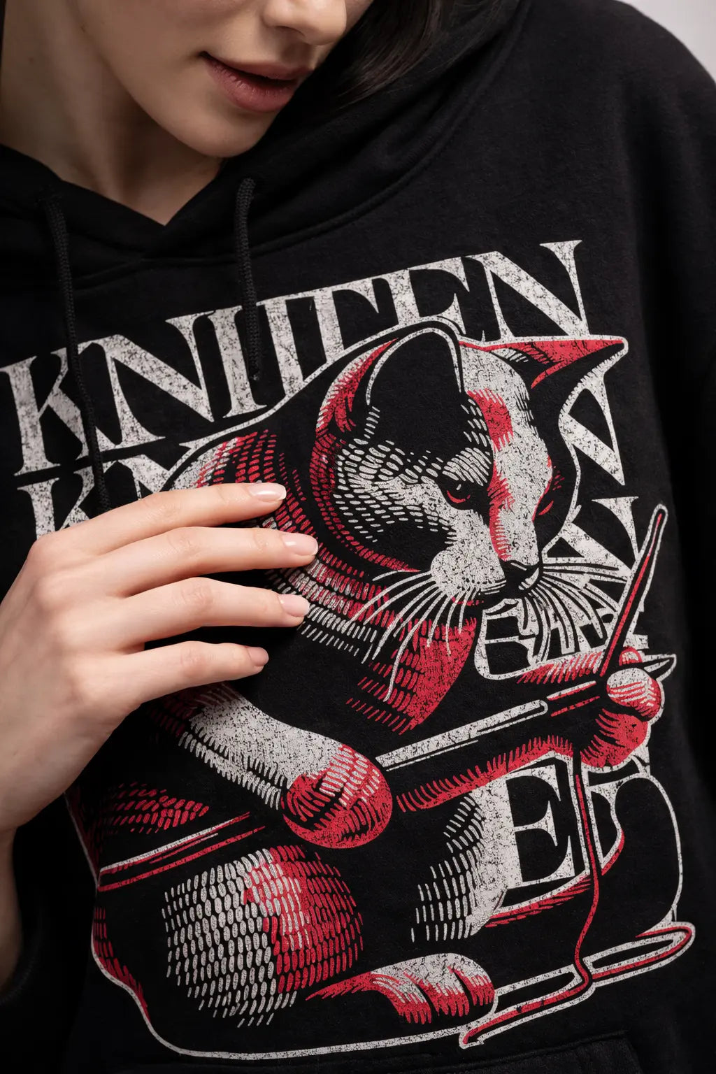 black oversized hoodie with knitten  aesthetic graphic print