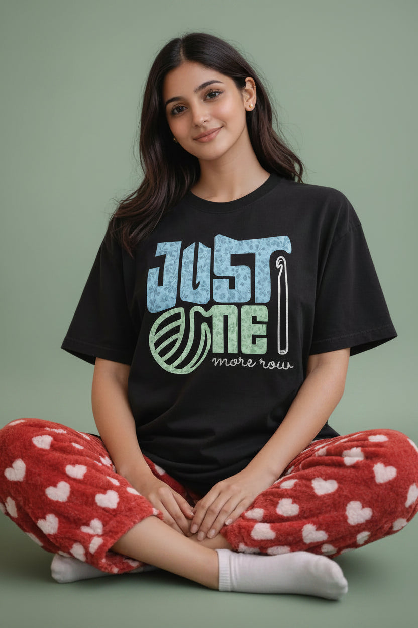 Woman wearing a casual  black oversized t-shirt  
