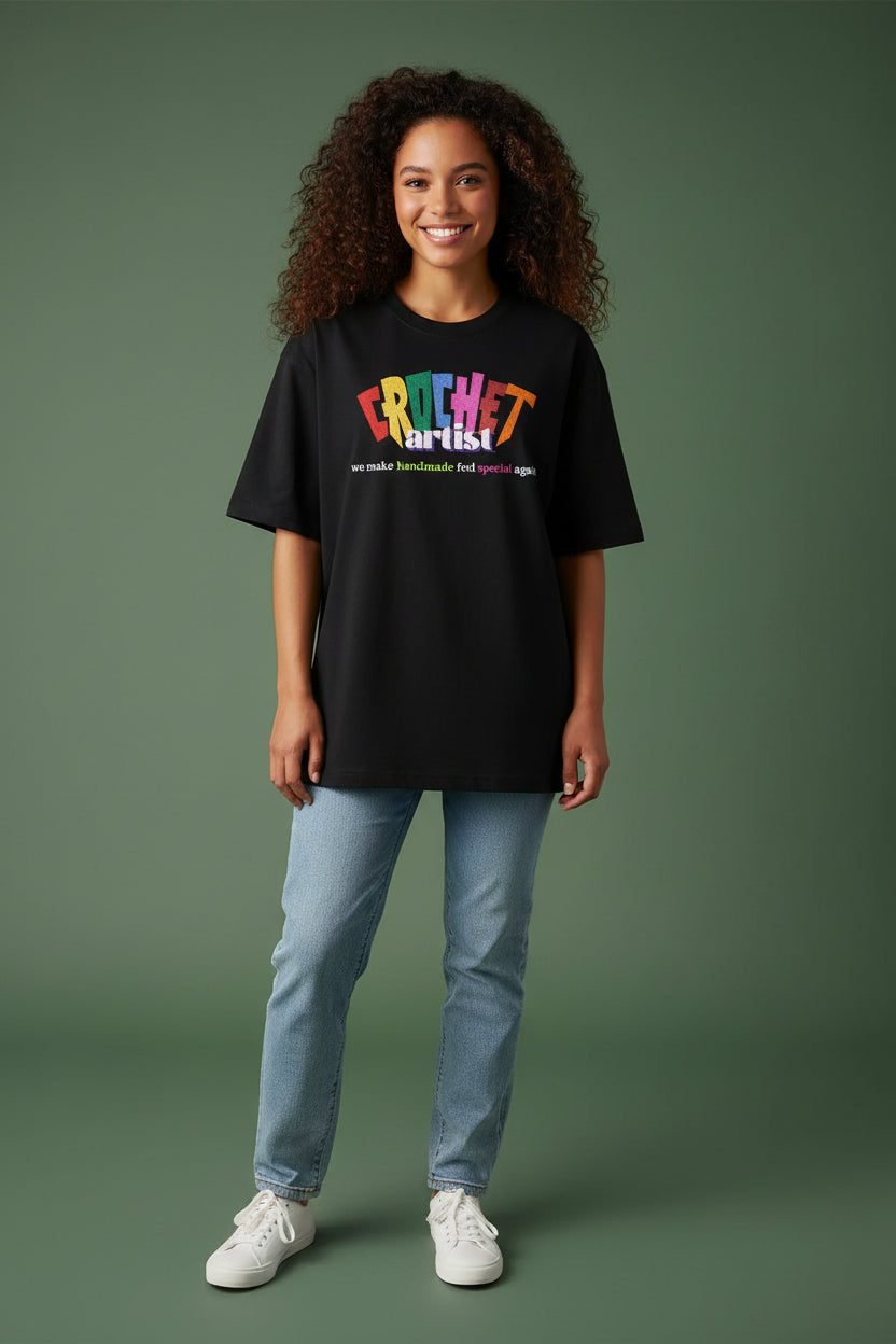 Black oversized t-shirt with  'Crochet artist we make handmade feel special again' on a  amazing print 